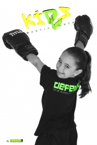 young girl with training gloves and kidz logo